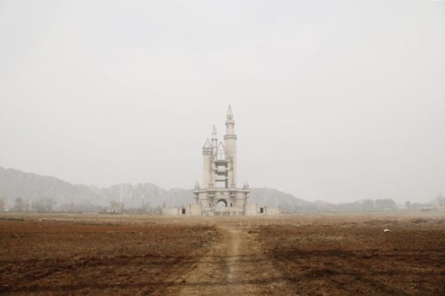 In the Changping District of China, some 20 miles outside of Beijing, the ruins of an abandoned fairy tale castle rises out of the desolate landscape. Author: Joe Wolf CC BY 2.0