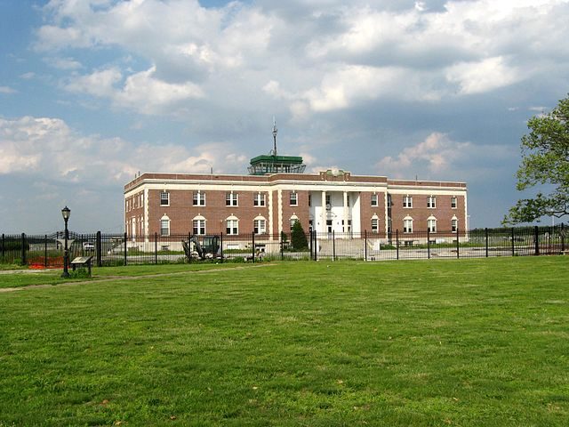 Former administration building (Building 1), which served as passenger terminal, air traffic control, baggage depot, freight transfer, and accommodation for air crews.