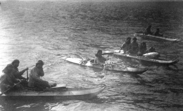 King Island residents in kayaks, about 1892.