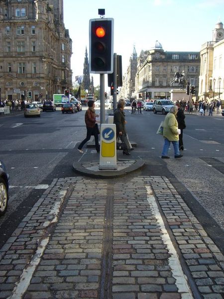 Cable car tracks on Waterloo Place. Author: kim traynor CC BY-SA 2.0