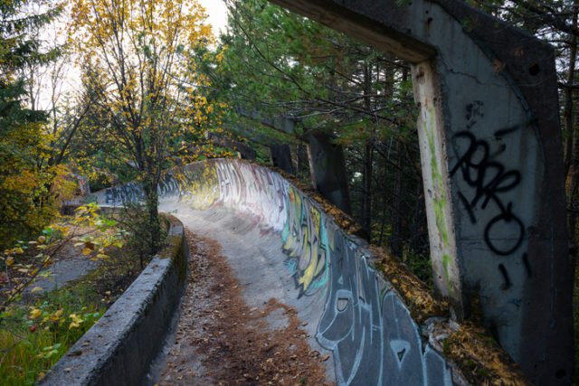 Sarajevo, Bosnia and Herzegovina – October 14, 2013: The abandoned bobsled and luge track from the 1984 Winter Olympics in Sarajevo, Bosnia and Herzegovina. During the siege of Sarajevo (1992-1995), the track was used as an artillery position by Bosnian Serb forces. 