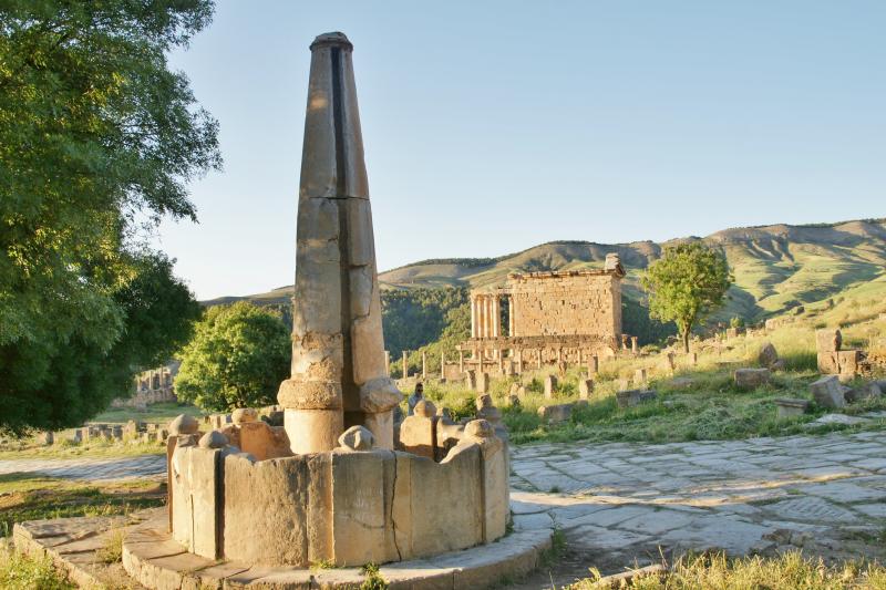 Conical fountain on the Cardo Maximus and view towards Severan Temple. Djemila, Algeria. Photo by: Yves Jalabert - Flikr CC BY-SA 2.0