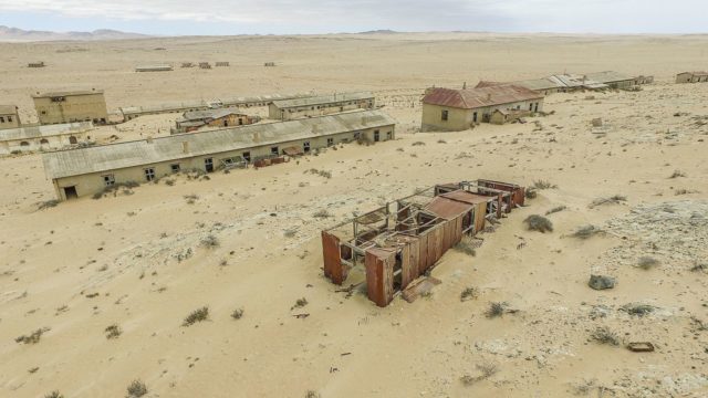 Kolmanskop, Coleman’s hill, is a ghost town in the Namib desert in southern Namibia, Kolmanskop Ghost Town Buildings are abandoned. Author: SkyPixels CC BY-SA 4.0