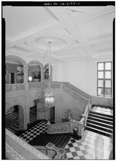 A staircase and hallway in Greystone Mansion.