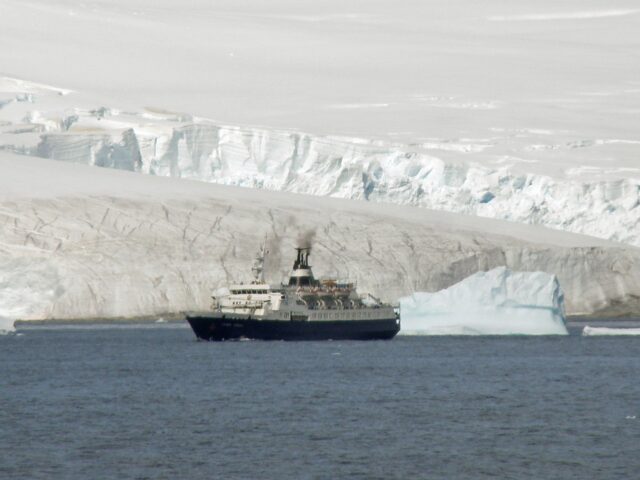 MV Lyubov Orlova sailing past Antarctica