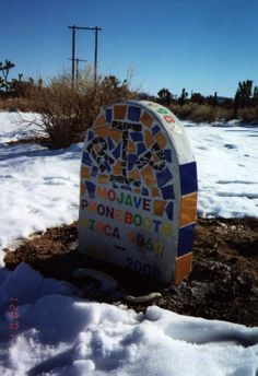 A tombstone for a phone booth.