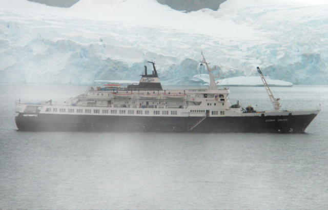 MV Lyubov Orlova sailing past Antarctica + Fog