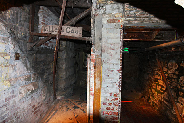 Two tunnels separated by a brick column in the Seattle Underground