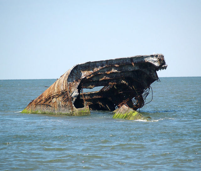 The wreckage of the SS Atlantus lies 150 feet off. Author: Luigi Novi CC BY 3.0