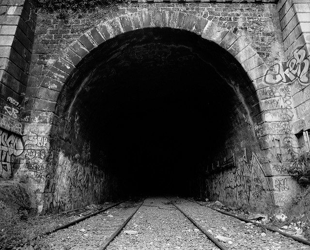 Into the dark tunnels of the Little Belt Railway. Author: Thomas Claveirole CC BY-SA 2.0