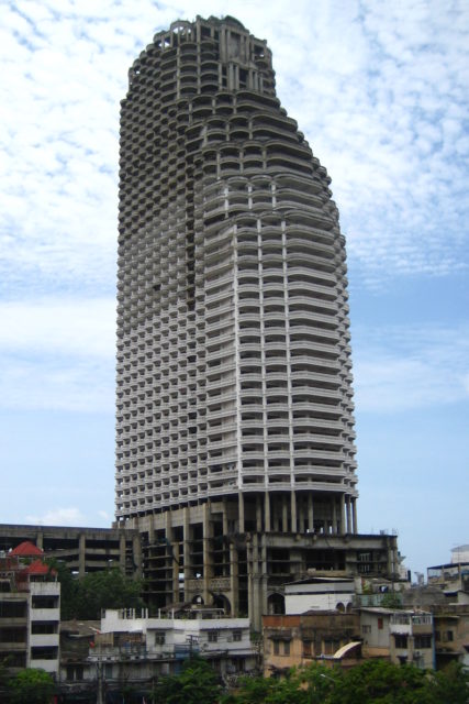 Sathorn Unique Tower, an abandoned skyscraper in Bangkok. Photo Credit: neajjean, CC BY-SA 2.0