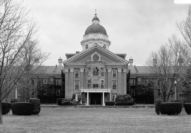 The frontispiece of the hospital is eerie as anything.