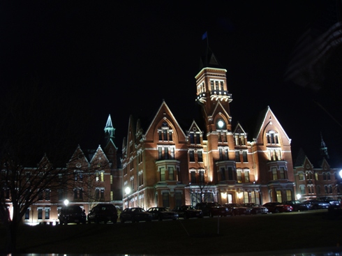 Danvers State Hospital at night.