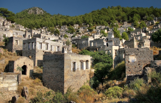 Stone buildings on a hillside.