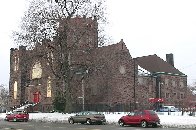 Cars parked outside of Woodward Avenue Presbyterian Church