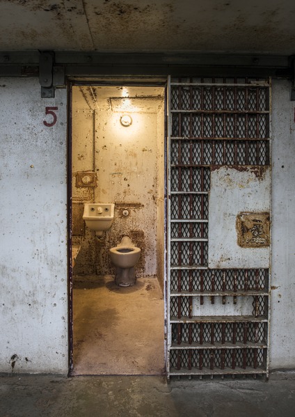 View from a hallway into a cell. 