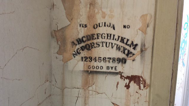 Ouija game board graffiti. Author: Bailey Hurlow CC BY-SA 2.0