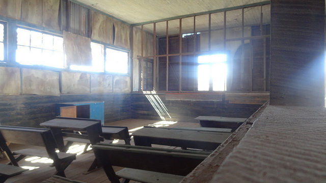 Dusty interior in one of the buildings. Author: Carlos Varela CC-BY 2.0