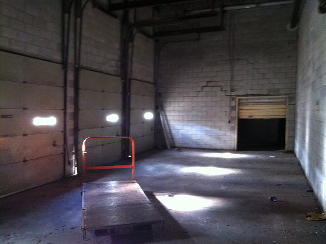 Abandoned storage room inside the mall. Author: Mike Kalasnik – CC-BY 2.0