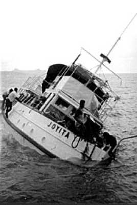 MV Joyita partially submerged. Author: Unknown photographer