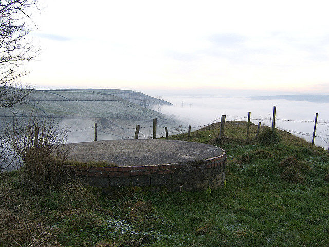 On top of one of the shafts alternative view. Author: Rob Glover CC BY-SA 2.0