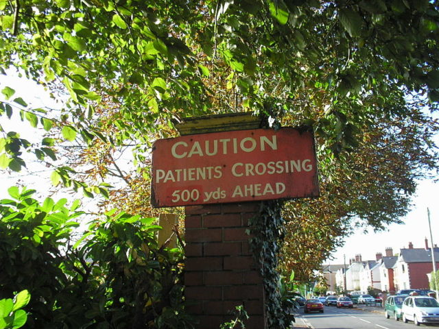 A sign warning of patients crossing. Author: Vaughan