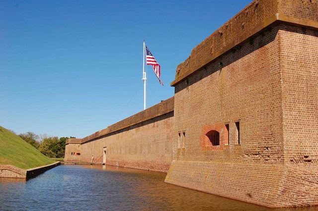 The red brick walls and the entrance. Author: Bubba73 CC BY 3.0