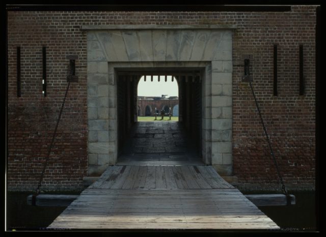 The red brick walls and the entrance. Author: http://www.loc.gov/pictures/item/ga0120.color.376617c Public Domain