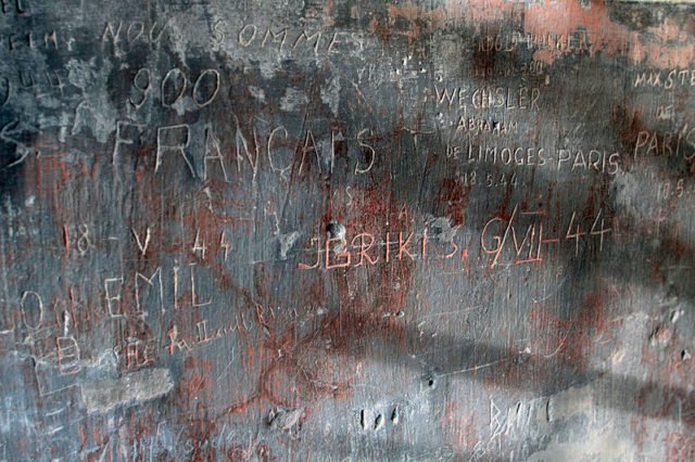 Old prisoner-inscriptions on one of the fort’s walls. Author: Staff Sgt. Keith Anderson