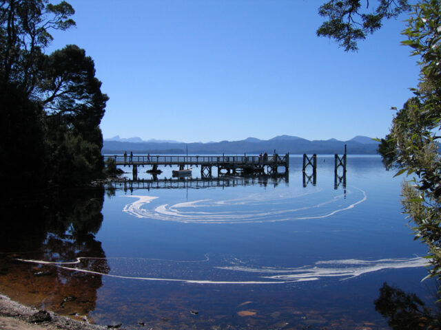 A ruined dock in water.