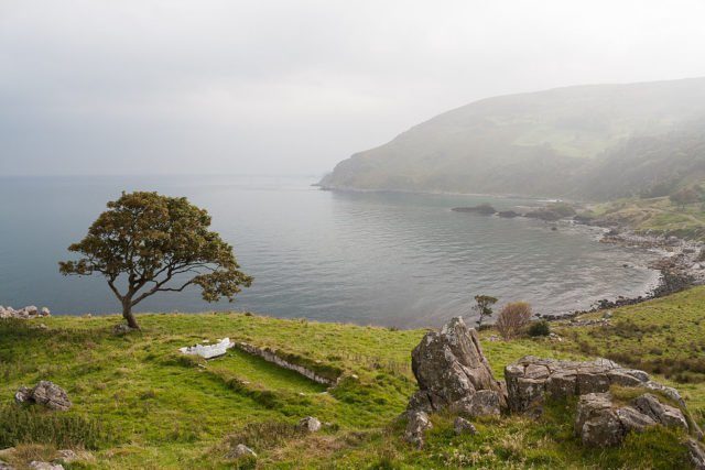 Surviving ruins of Drumnakill Church in the townland of Bighouse, located close to a group of rocks at Murlough Bay. Andreas F. Borchert CC BY-SA 3.0