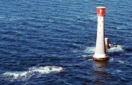 The current Eddystone Light, with the stump of Smeaton’s lighthouse behind.