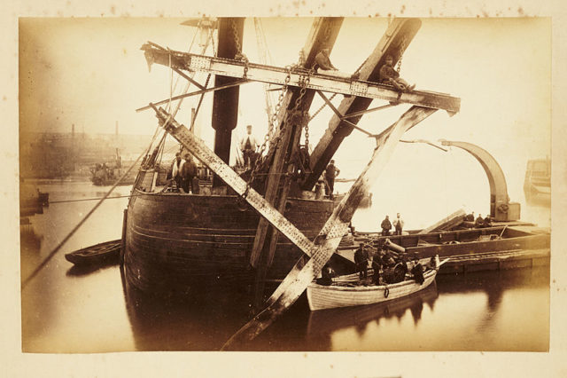 Salvaging the wreckage of the bridge.