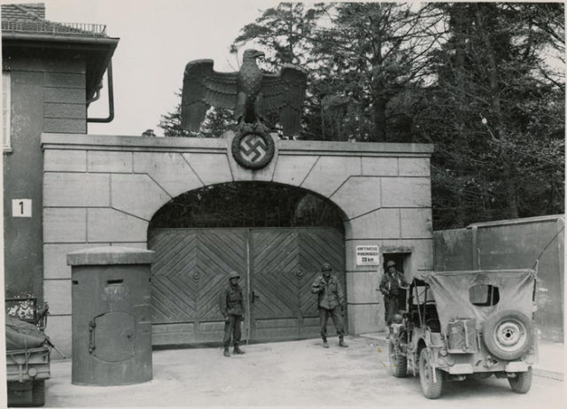 American troops in front of the camp.