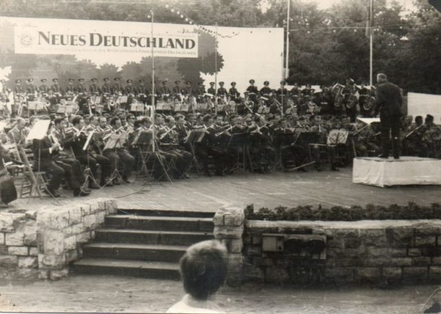 United military band of Poland, the Czech Republic and the GDR is performing at a festive event dedicated to the anniversary of the German socialist newspaper Neues Deutschland. Some of the musicians were from the orchestra of the 69th Motorized Rifle Regiment. Source: Private Archive