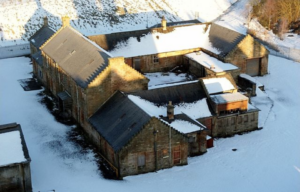 Aerial view of Hartwood Hospital covered in snow