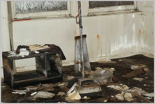 Debris scattered around a rusty vacuum