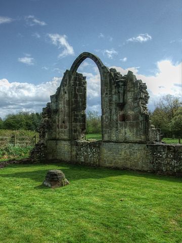 The ruins of a stone arch.