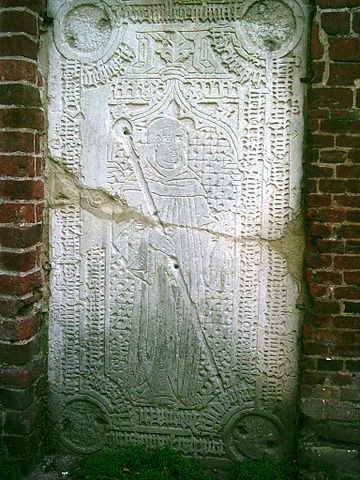 The gravestone of the abbot Johannes VII (died on 11th May 1473 ) is an amazingly elaborate piece of stonework. Author: Harald909 – CC BY-SA 3.0