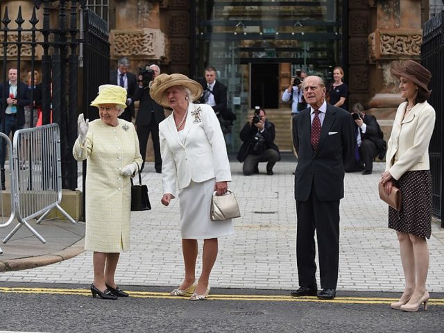 Queen Elizabeth and Prince Philip visited Crumlin Road Gaol, with Dame Mary Peters and NI Secretary of State, Theresa Villiers, June 24, 2014. Author: Northern Ireland Office CC BY 2.0