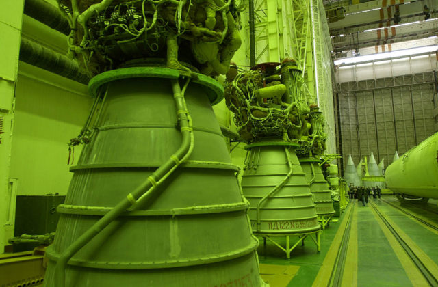 Rocket thrusters lined up along the wall of the assembly and refueling complex at the Baikonur Cosmodrome