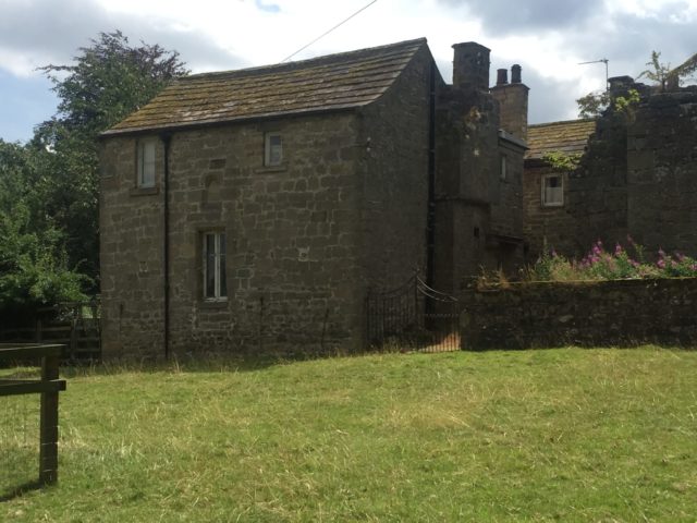 One of the cottages/buildings at the edge of the estate. Author: Charlotte Bond