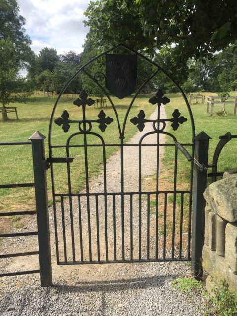 Inside the abbey, looking out of the gate. Author: Charlotte Bond