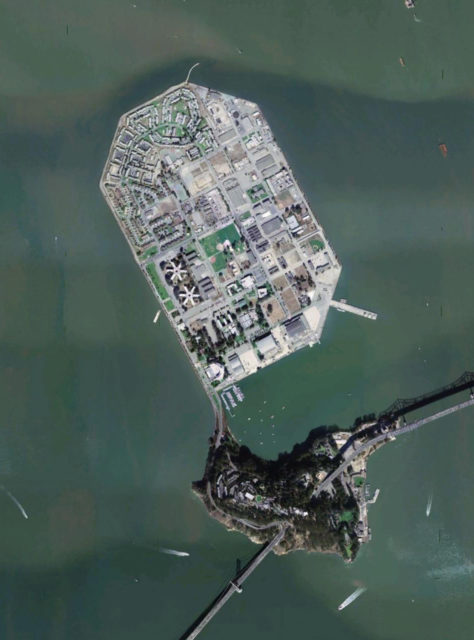 Two similar asterisk-shaped buildings are the barracks – Cosson Hall – which are currently abandoned on Treasure Island, San Francisco.  By NASA – Satellite imagery taken from NASA World Wind software.