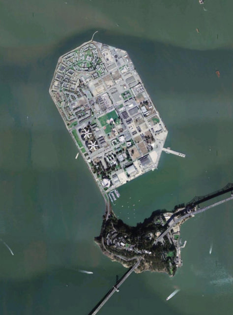 Two similar asterisk-shaped buildings are the barracks – Cosson Hall – which are currently abandoned on Treasure Island, San Francisco. By NASA – Satellite imagery taken from NASA World Wind software.