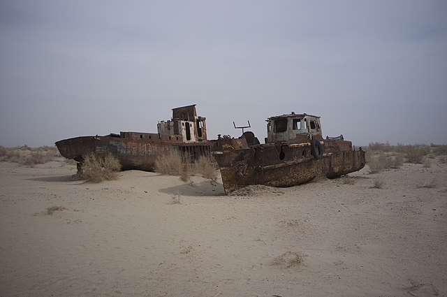 Two ships stranded in the middle of the desert