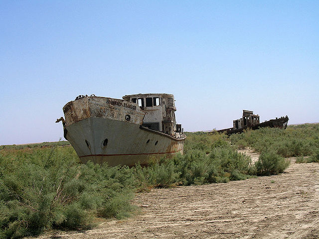 Two ships stranded in the middle of a grassy area
