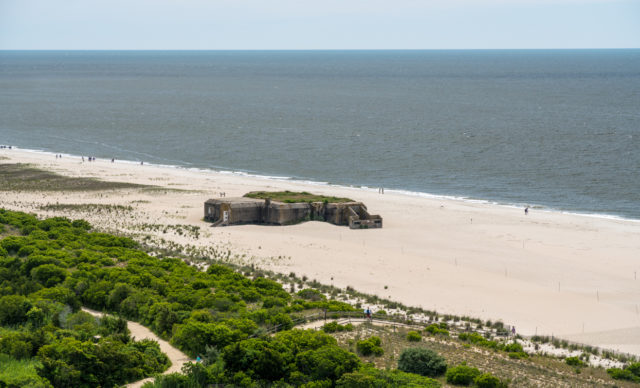 World War Two concrete bunker on the beach at Cape May Point in New Jersey. By BackyardProduction