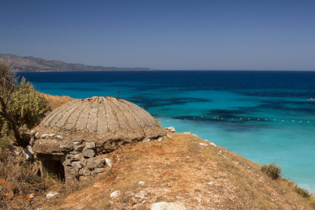 A defensive bunker on the seashore in Albania. By Sergii Zyskо