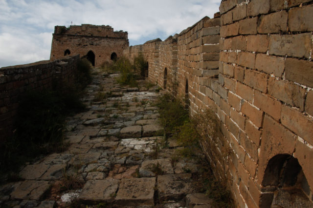 Ruined Cobblestone Path in the Great Wall of China. By Eduard Figueres